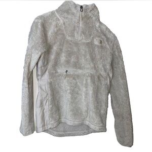 tan sherpa north face quarterzip wind breaker. warm and has a pocket in front